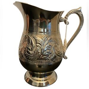 Ornate Silver Pitcher